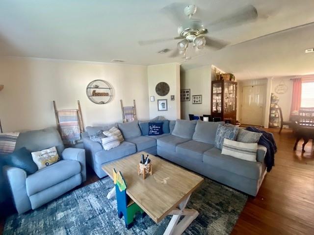 3025 Matthews Road Fort Pierce, FL 34945 - Photo 34 of 35 a living room with furniture and a chandelier