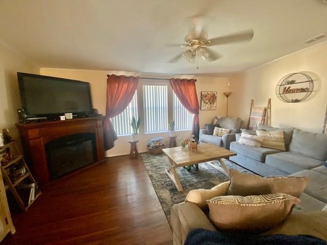 3025 Matthews Road Fort Pierce, FL 34945 - Photo 35 of 35 a living room with furniture a flat screen tv and a fireplace