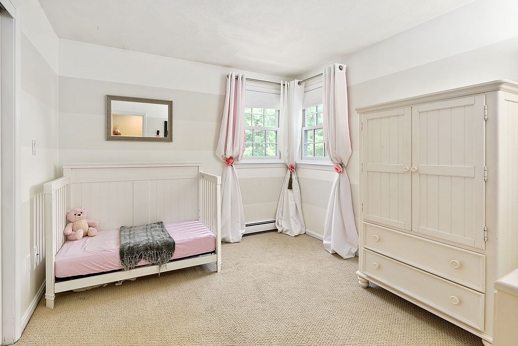 7 Old Bare Hill Road Boxford, MA 01921 - Photo 28 of 42 a room with a bed and a window