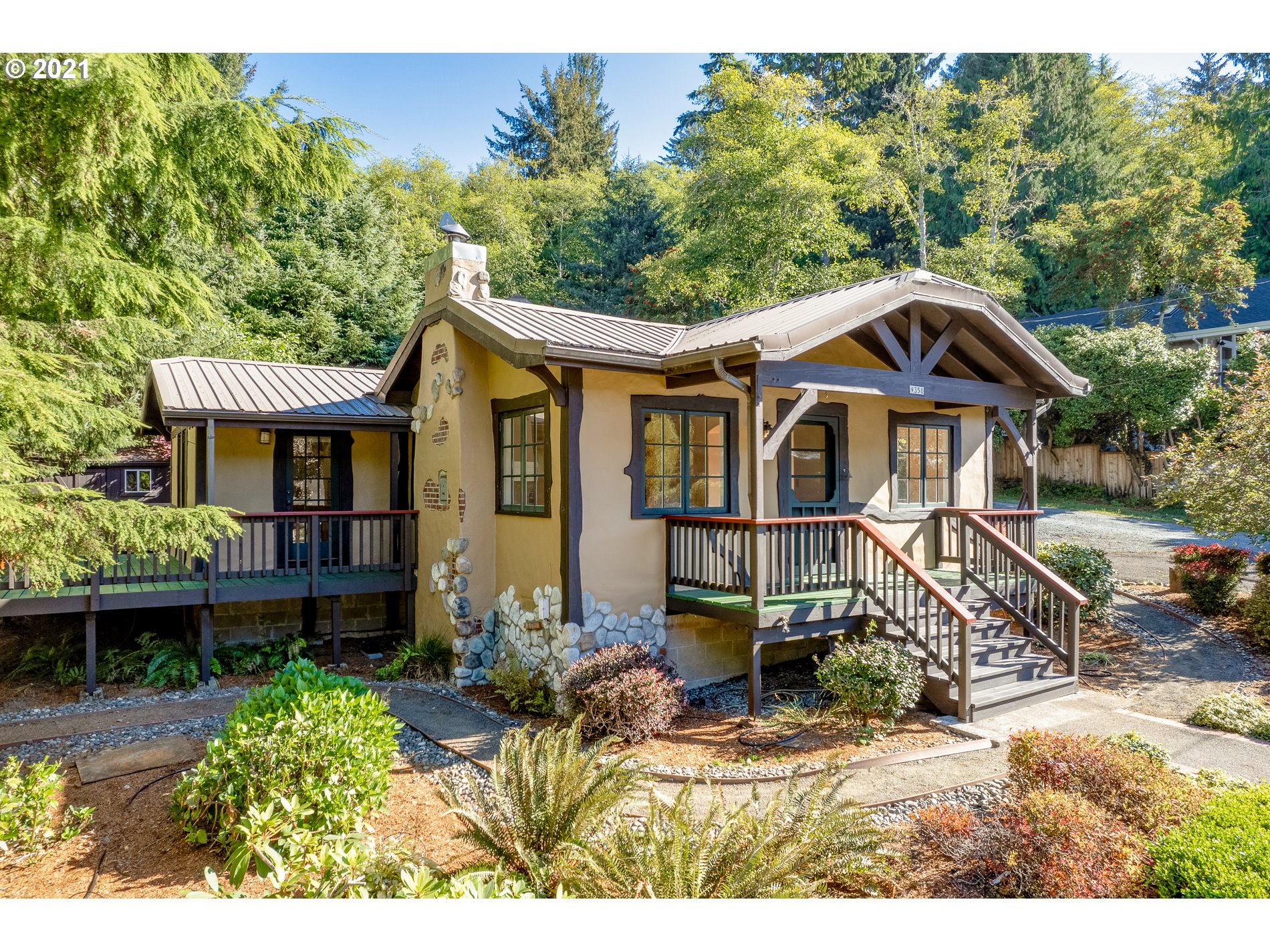 9350 Nehalem Road Nehalem, OR 97131 - Photo 1 of 31 a front view of a house with a yard