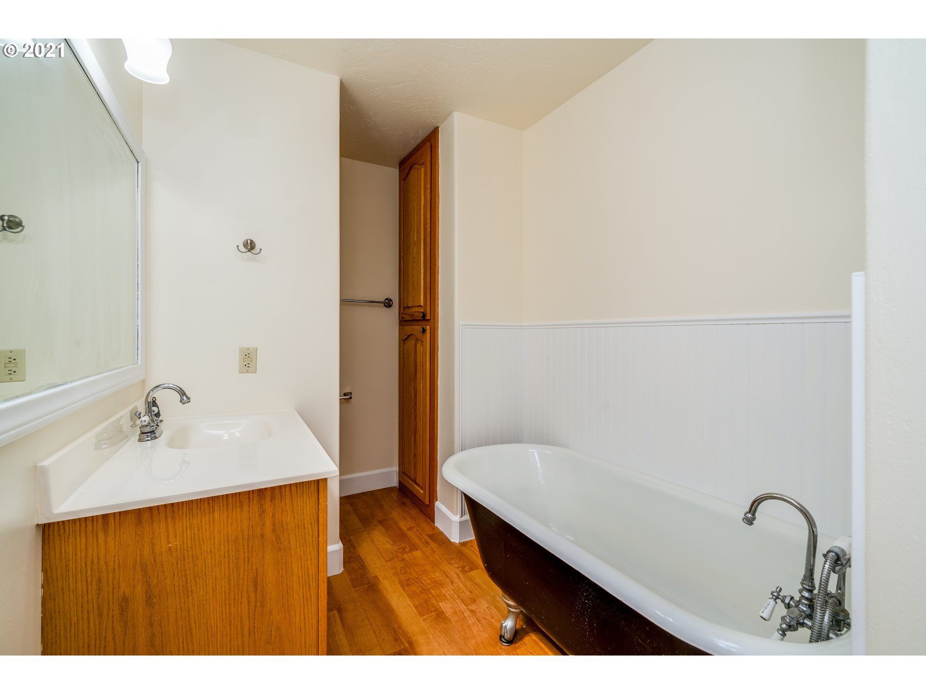 9350 Nehalem Road Nehalem, OR 97131 - Photo 22 of 31 a bathroom with a sink and a mirror