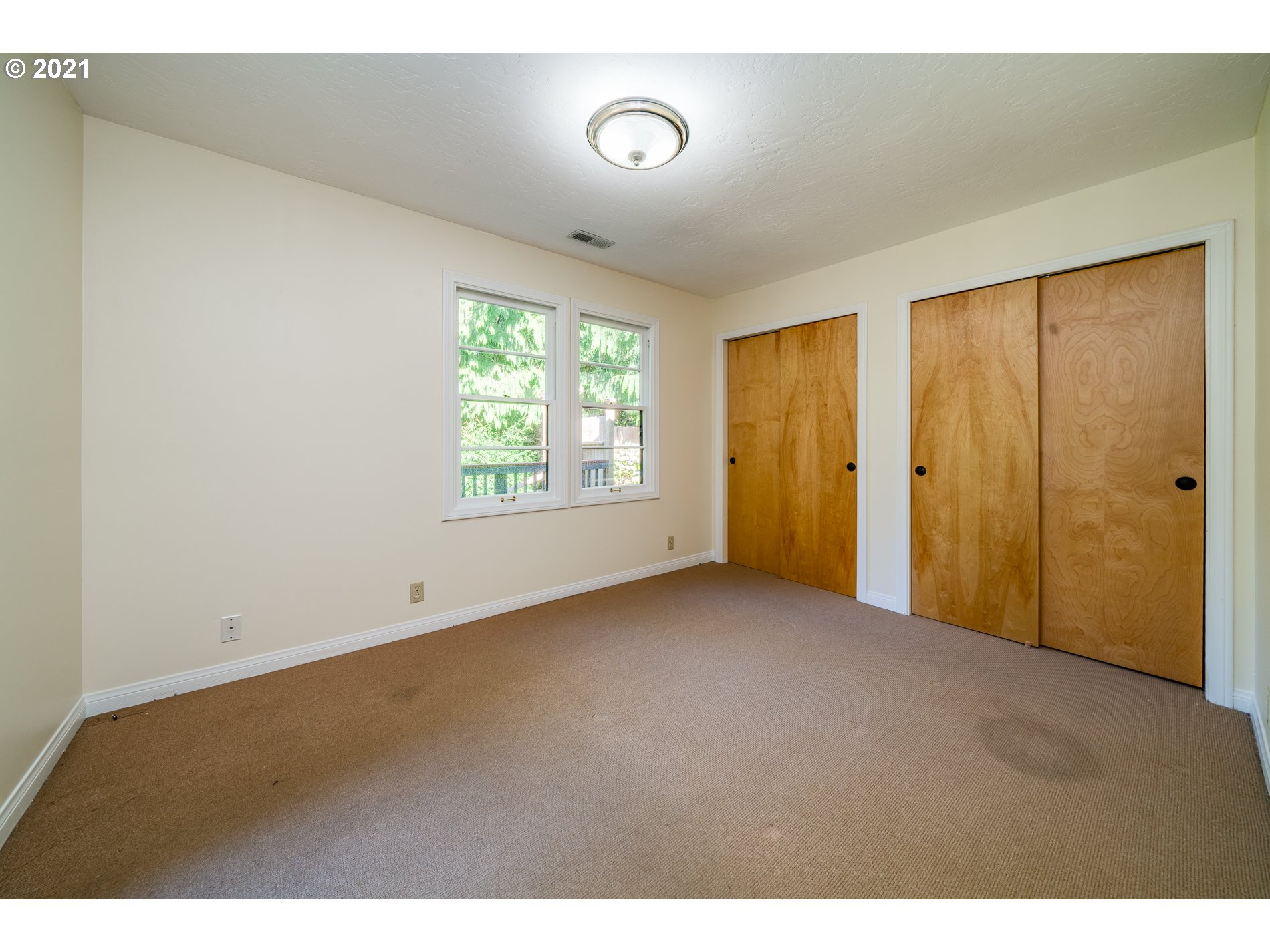 9350 Nehalem Road Nehalem, OR 97131 - Photo 23 of 31 a view of an empty room with a window