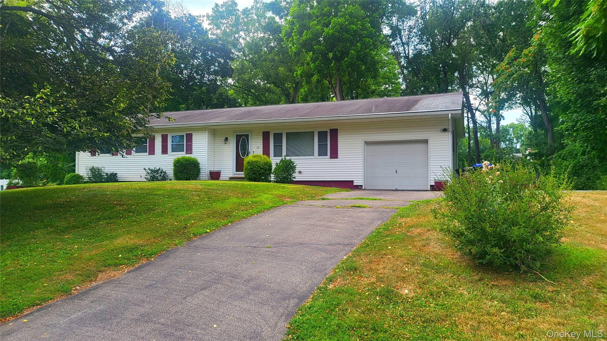 12 High Ridge Road Poughkeepsie, NY 12603 - Photo 3 of 34 Garage, front lawn, and driveway