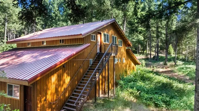 a view of house with staircase and wooden floor