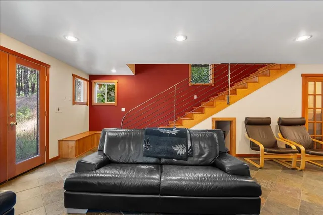 a living room with furniture and a couch