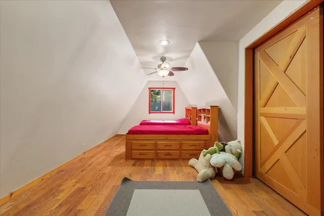 a room with toys and wooden floor