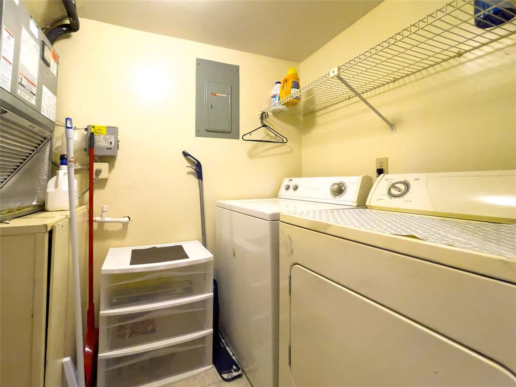 317 Knotty Pine Circle, Unit C2 Greenacres, FL 33463 - Photo 15 of 51 a utility room with dryer and washer