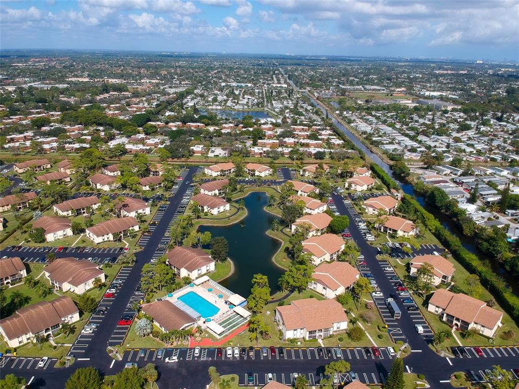 317 Knotty Pine Circle, Unit C2 Greenacres, FL 33463 - Photo 48 of 51 an aerial view of multiple house