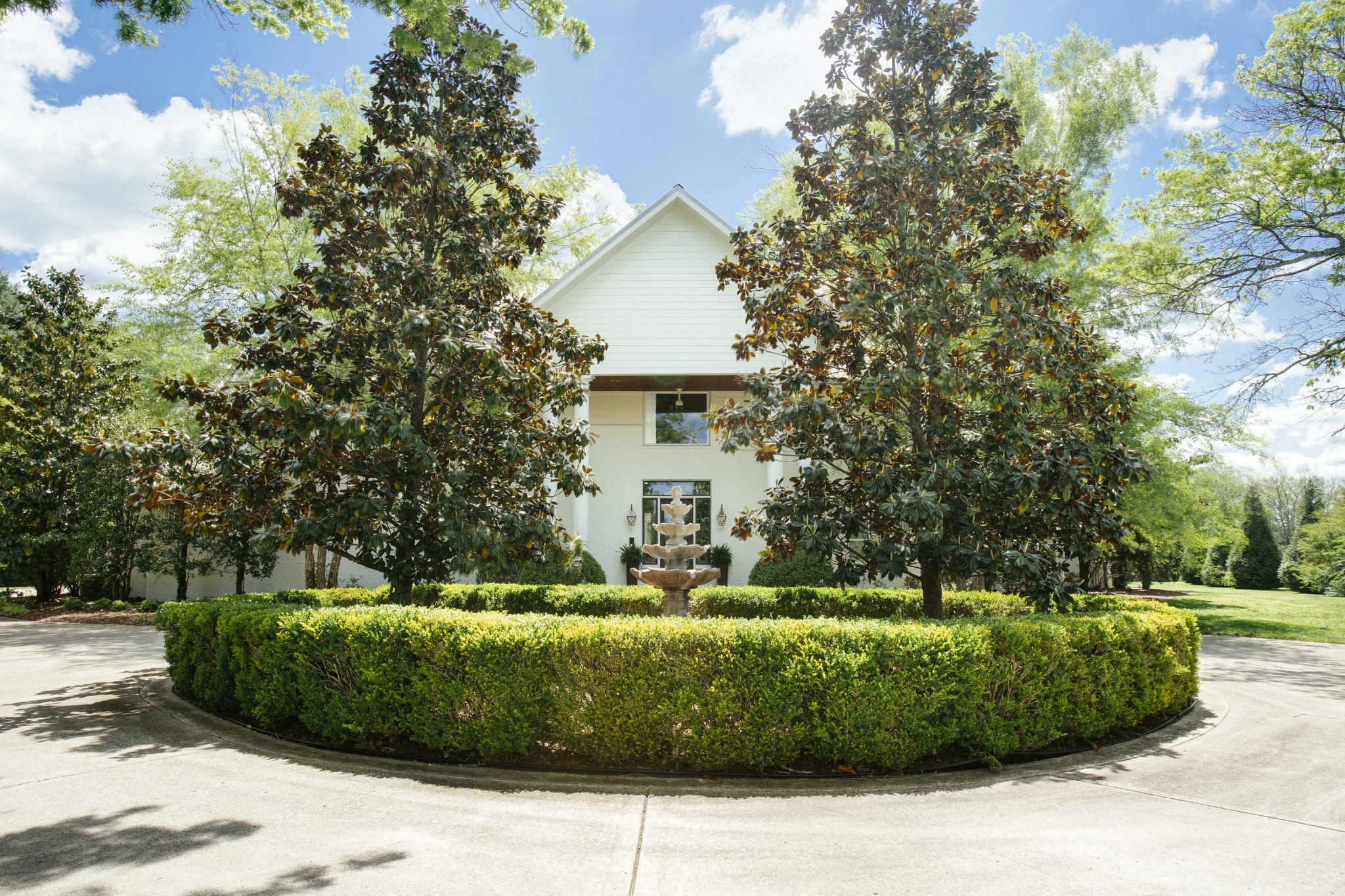 a view of a house with a garden