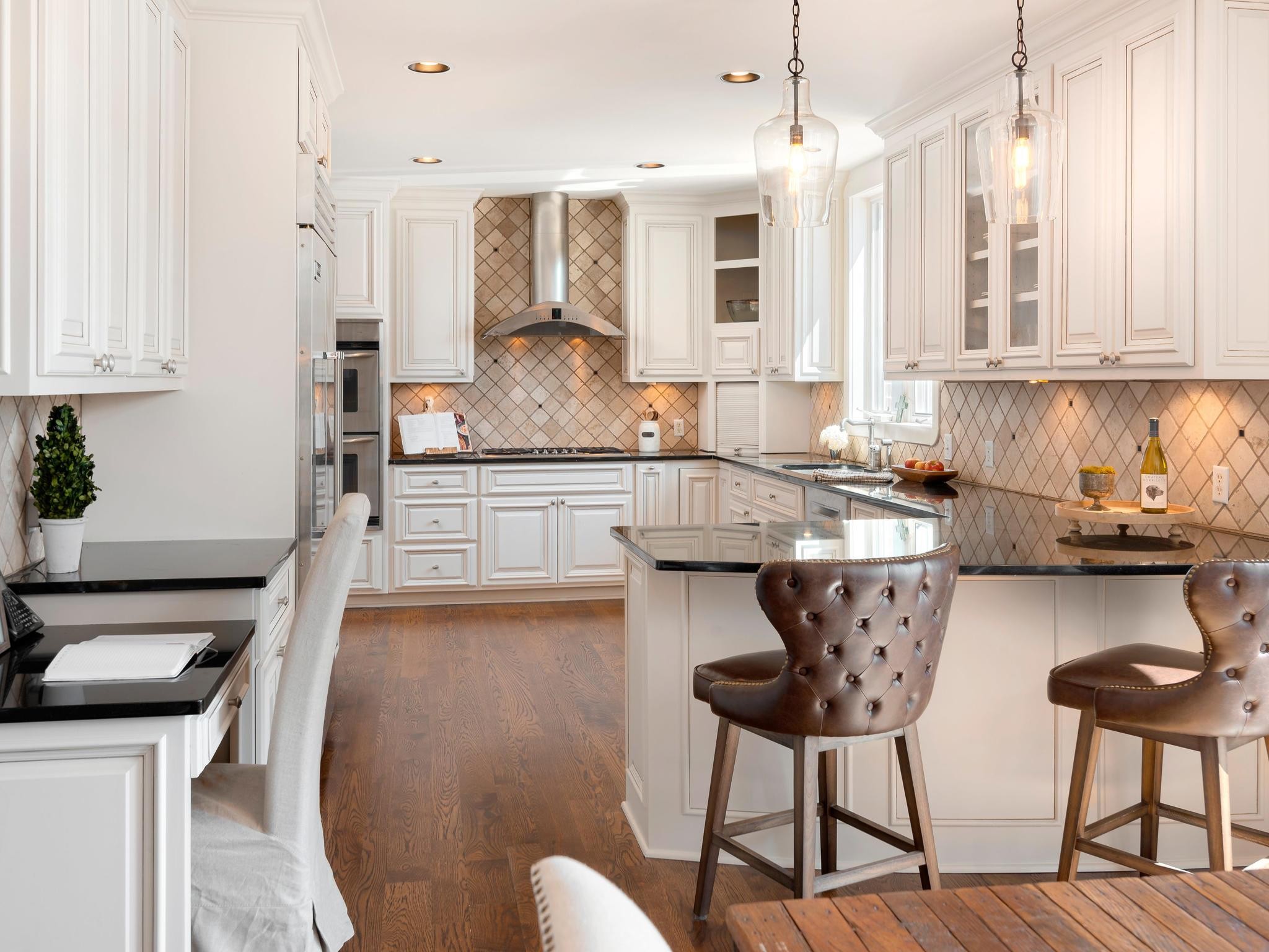 1539 Old Hillsboro Road Franklin, TN 37069 - Photo 12 of 38 a kitchen with stainless steel appliances granite countertop a kitchen island a stove a cabinets a sink and a island