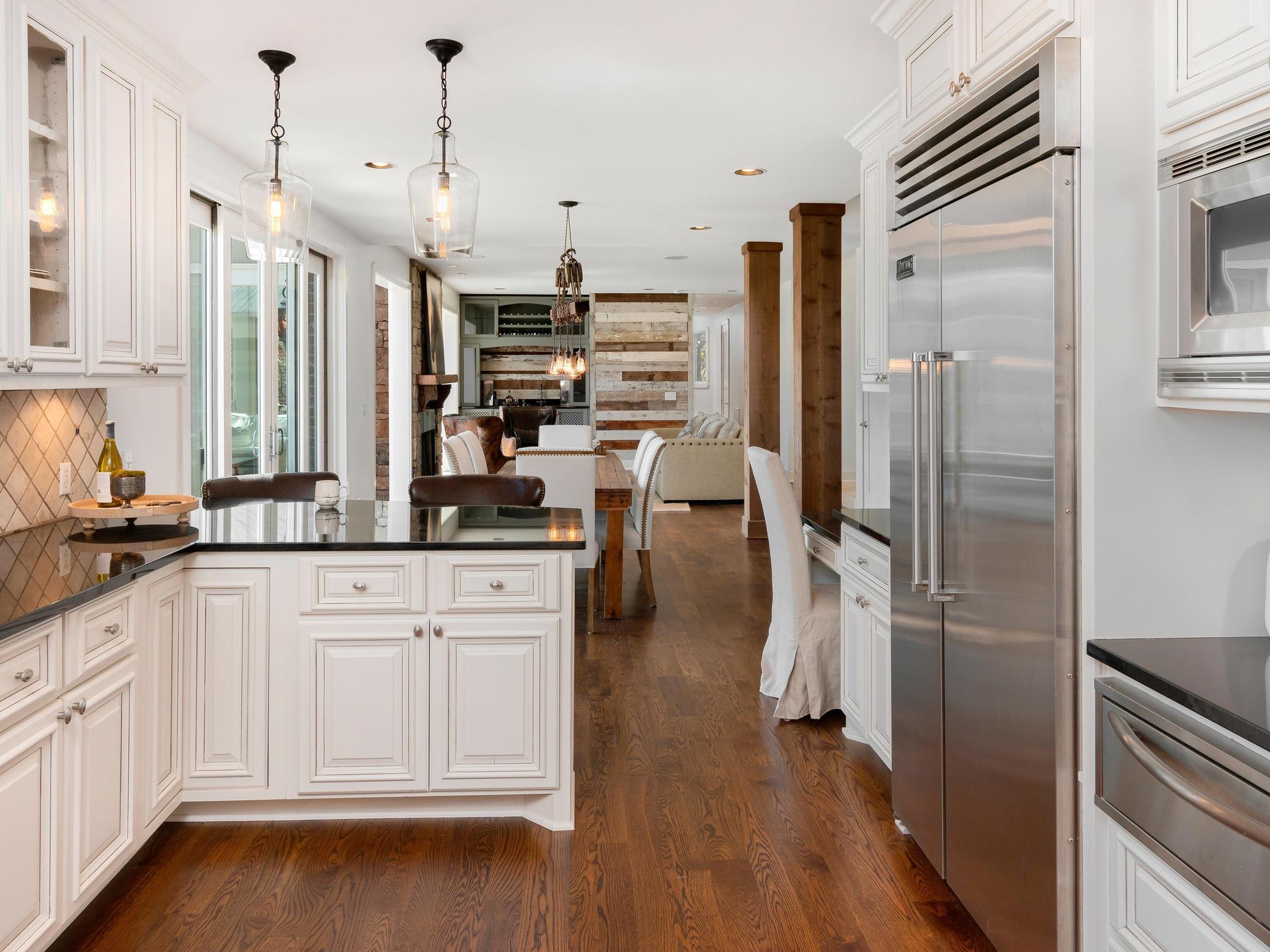 1539 Old Hillsboro Road Franklin, TN 37069 - Photo 13 of 38 a kitchen with stainless steel appliances a refrigerator and wooden floor