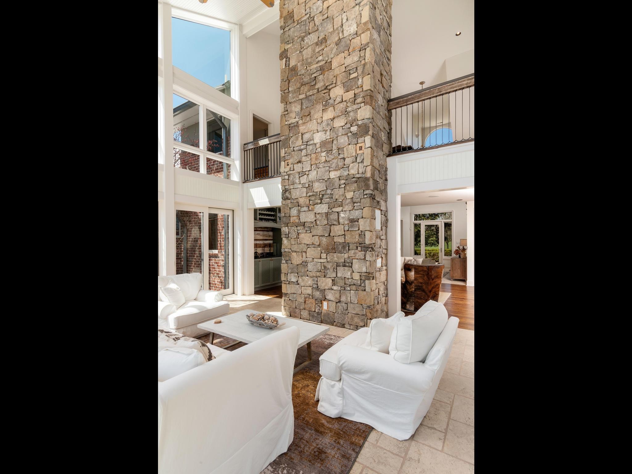 1539 Old Hillsboro Road Franklin, TN 37069 - Photo 17 of 38 a view of a patio with white walls