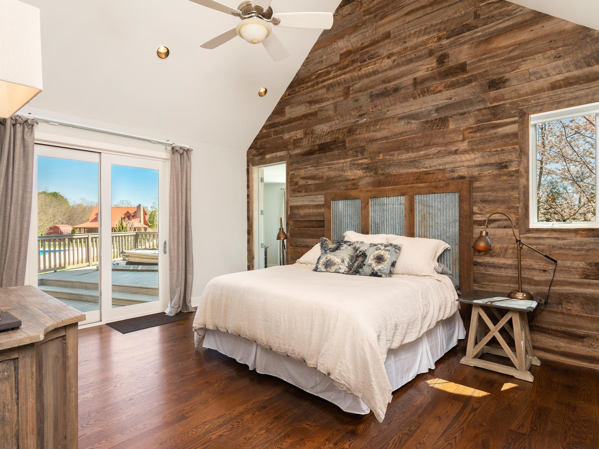 1539 Old Hillsboro Road Franklin, TN 37069 - Photo 18 of 38 a bedroom with a bed and wooden floor