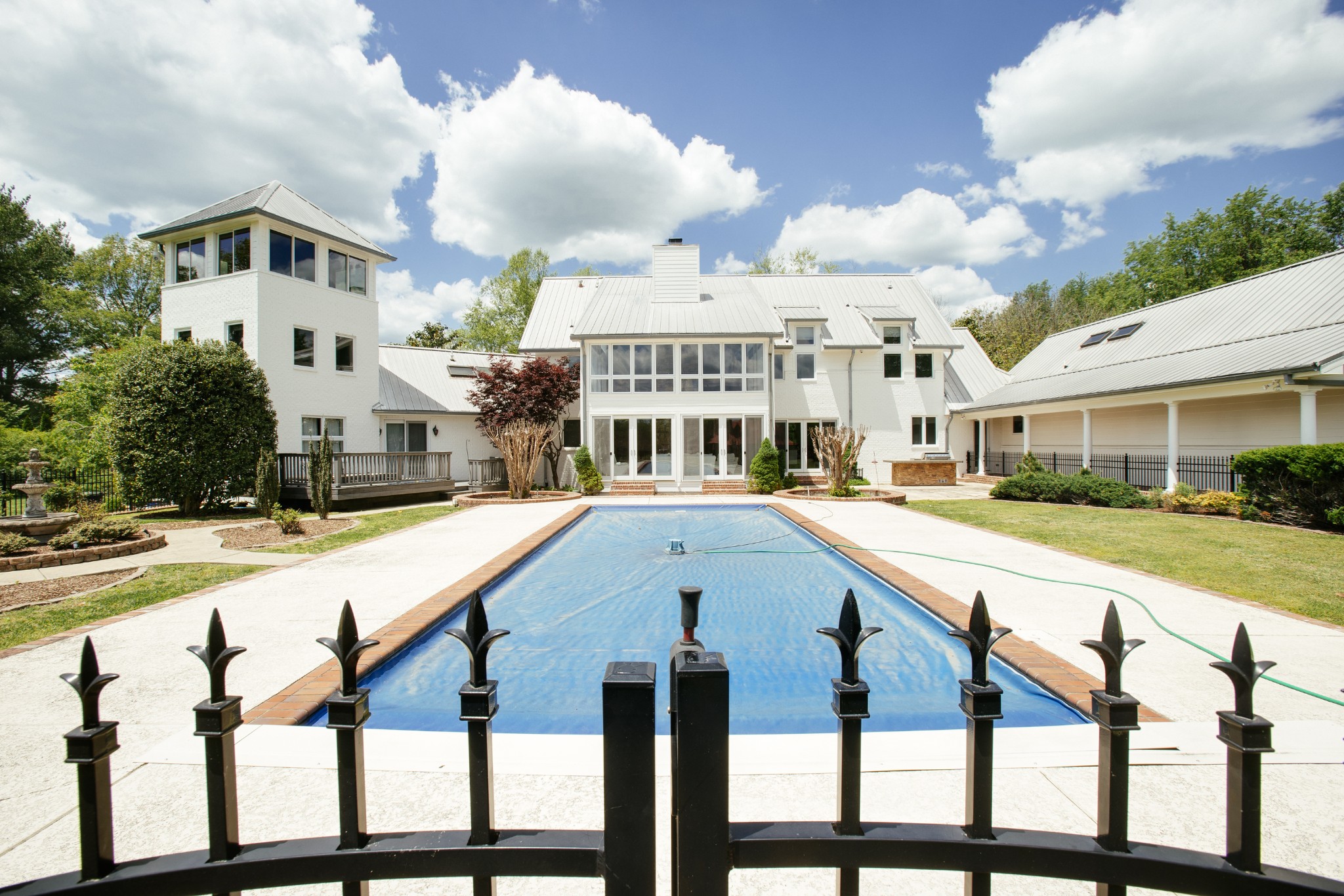 1539 Old Hillsboro Road Franklin, TN 37069 - Photo 25 of 38 a view of building with swimming pool and sitting area