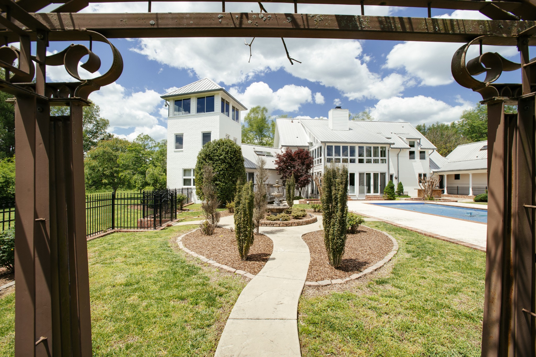 1539 Old Hillsboro Road Franklin, TN 37069 - Photo 29 of 38 a view of a swimming pool with sitting area