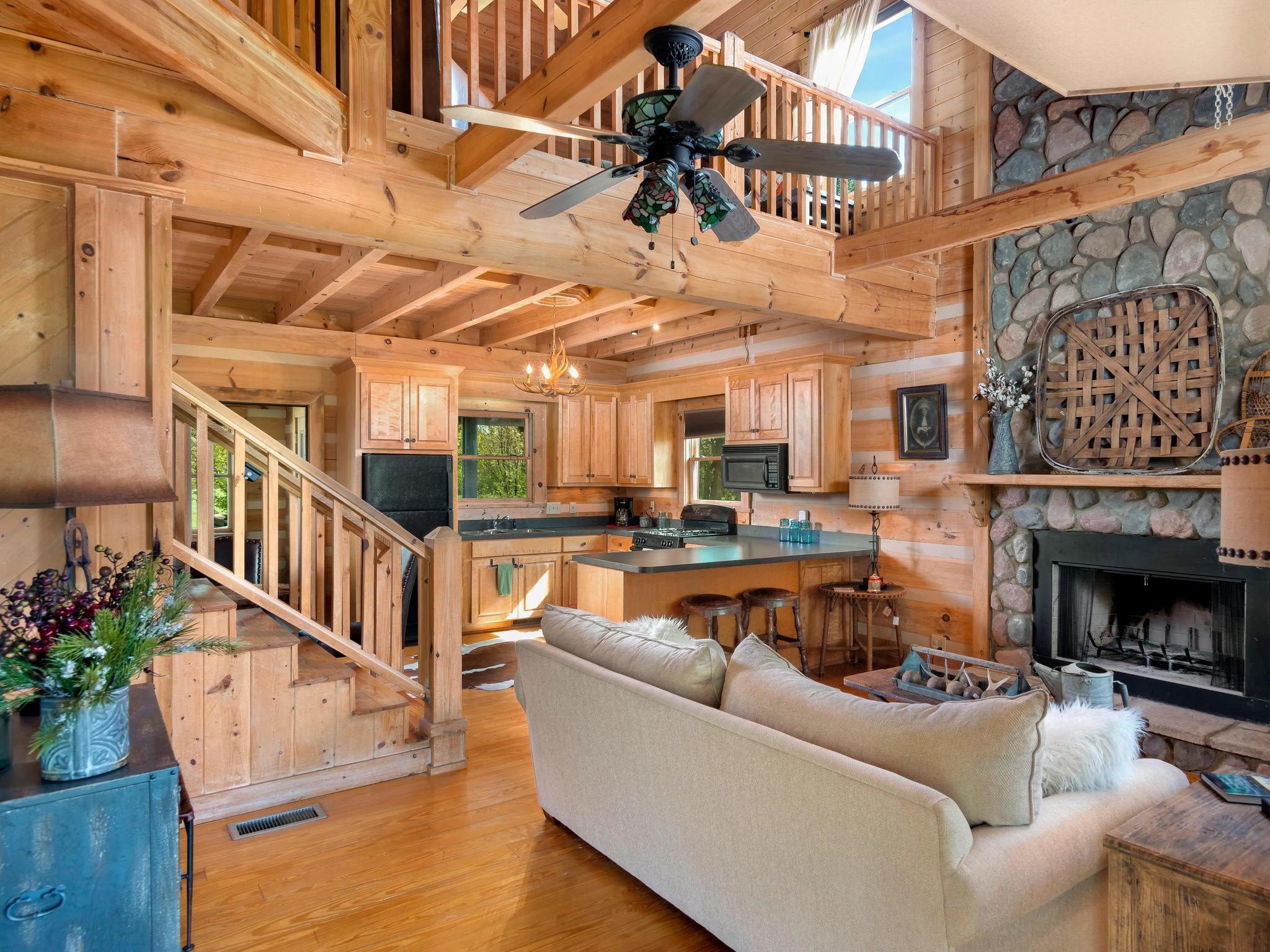 1539 Old Hillsboro Road Franklin, TN 37069 - Photo 33 of 38 a living room with furniture a fireplace and a potted plant