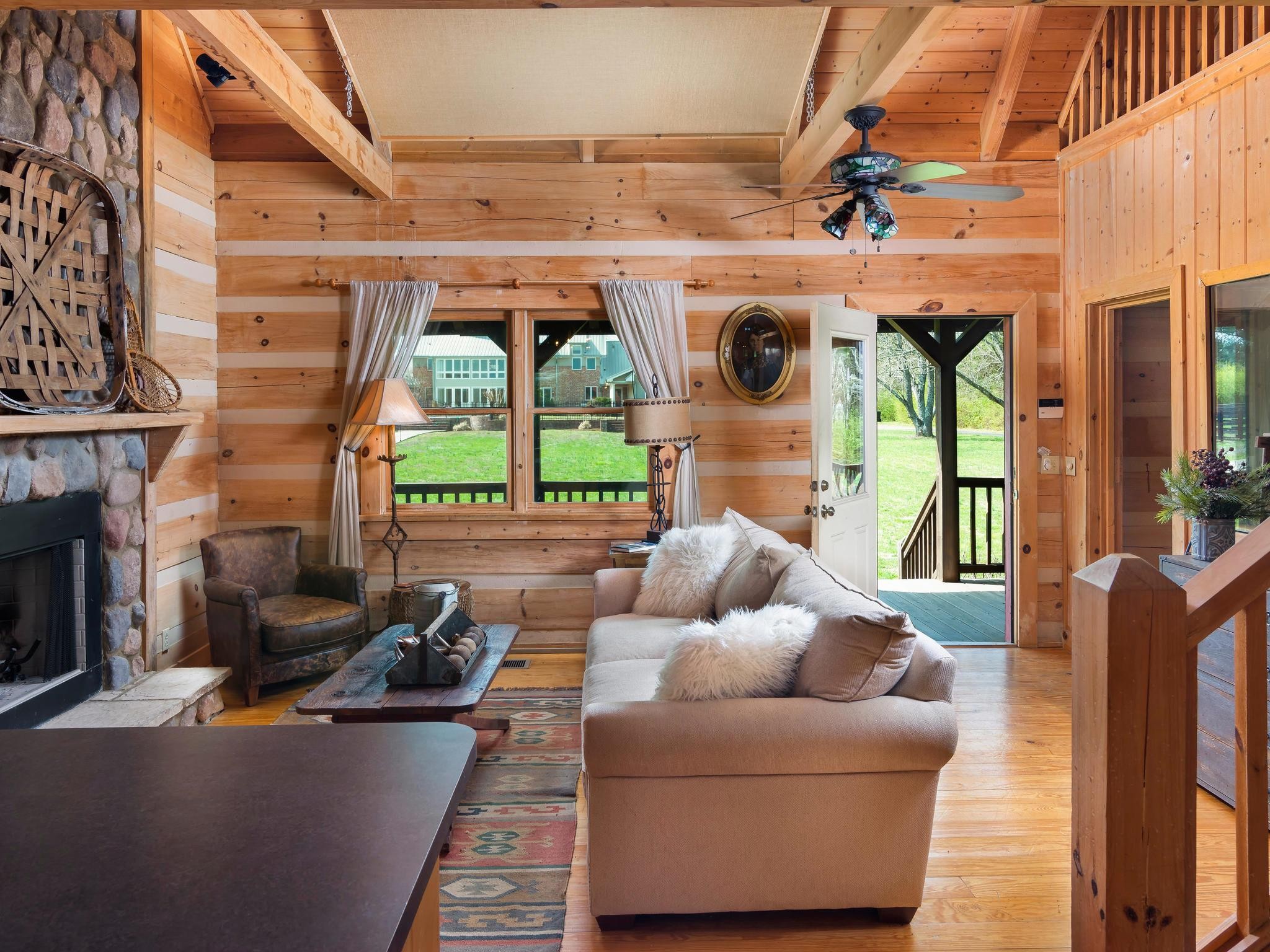 1539 Old Hillsboro Road Franklin, TN 37069 - Photo 34 of 38 a living room with fireplace furniture and a floor to ceiling window