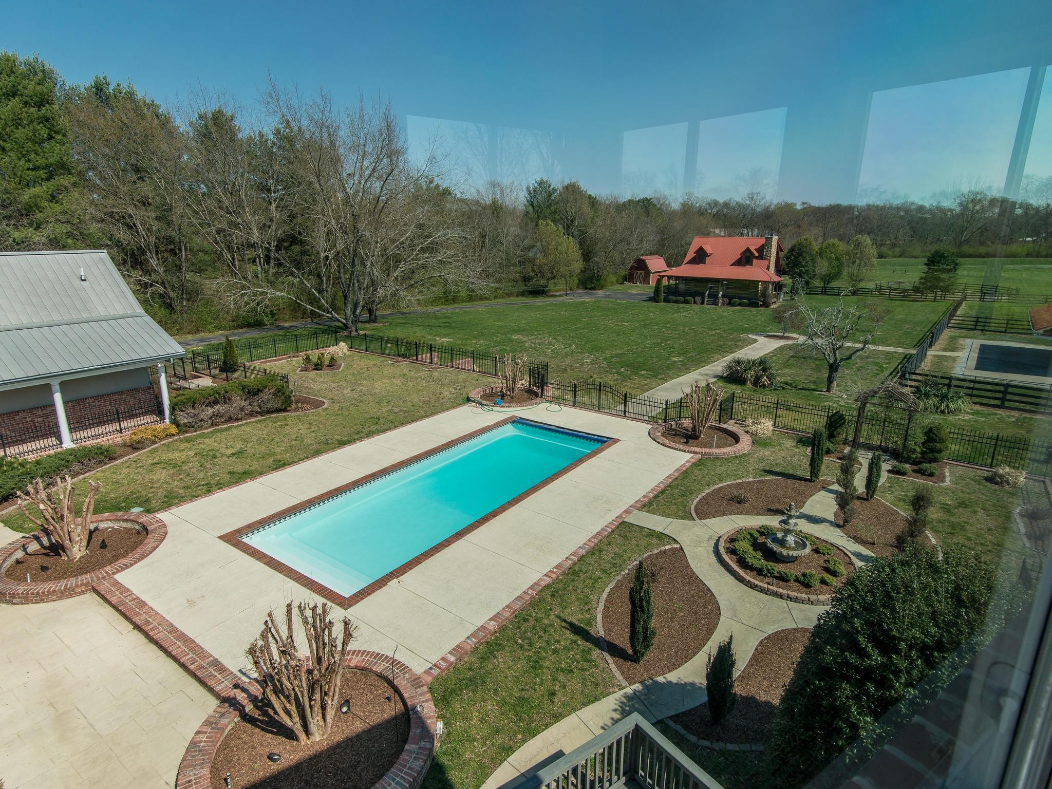 1539 Old Hillsboro Road Franklin, TN 37069 - Photo 36 of 38 a view of a backyard with plants and patio