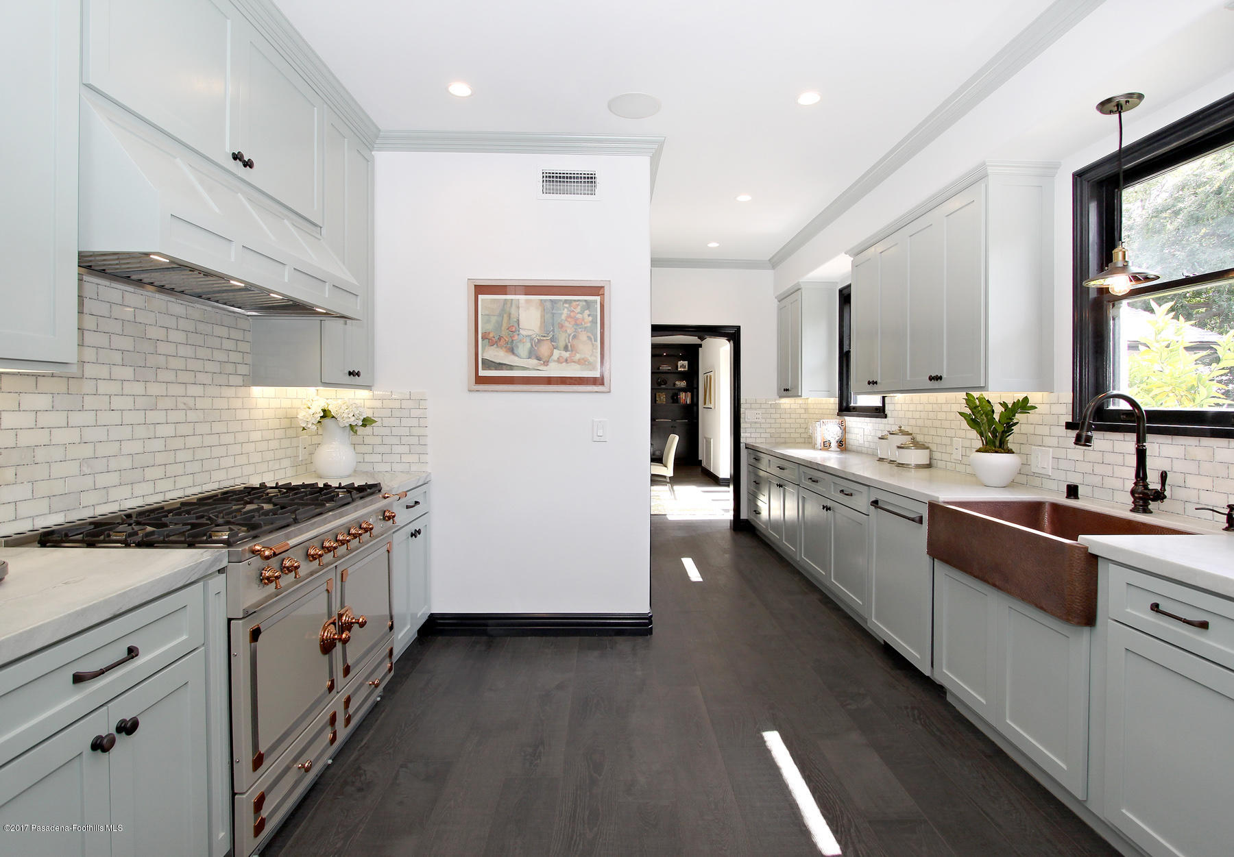 1415 Parkview Avenue Pasadena, CA 91103 - Photo 12 of 35 a kitchen with stainless steel appliances granite countertop a stove a sink and a refrigerator