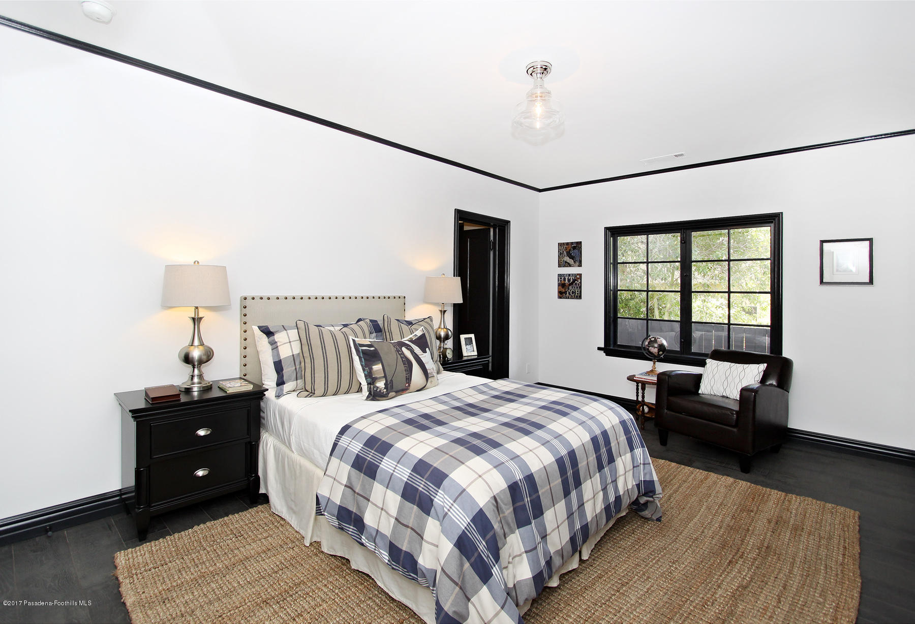 1415 Parkview Avenue Pasadena, CA 91103 - Photo 16 of 35 a bed room with a bed and a couch