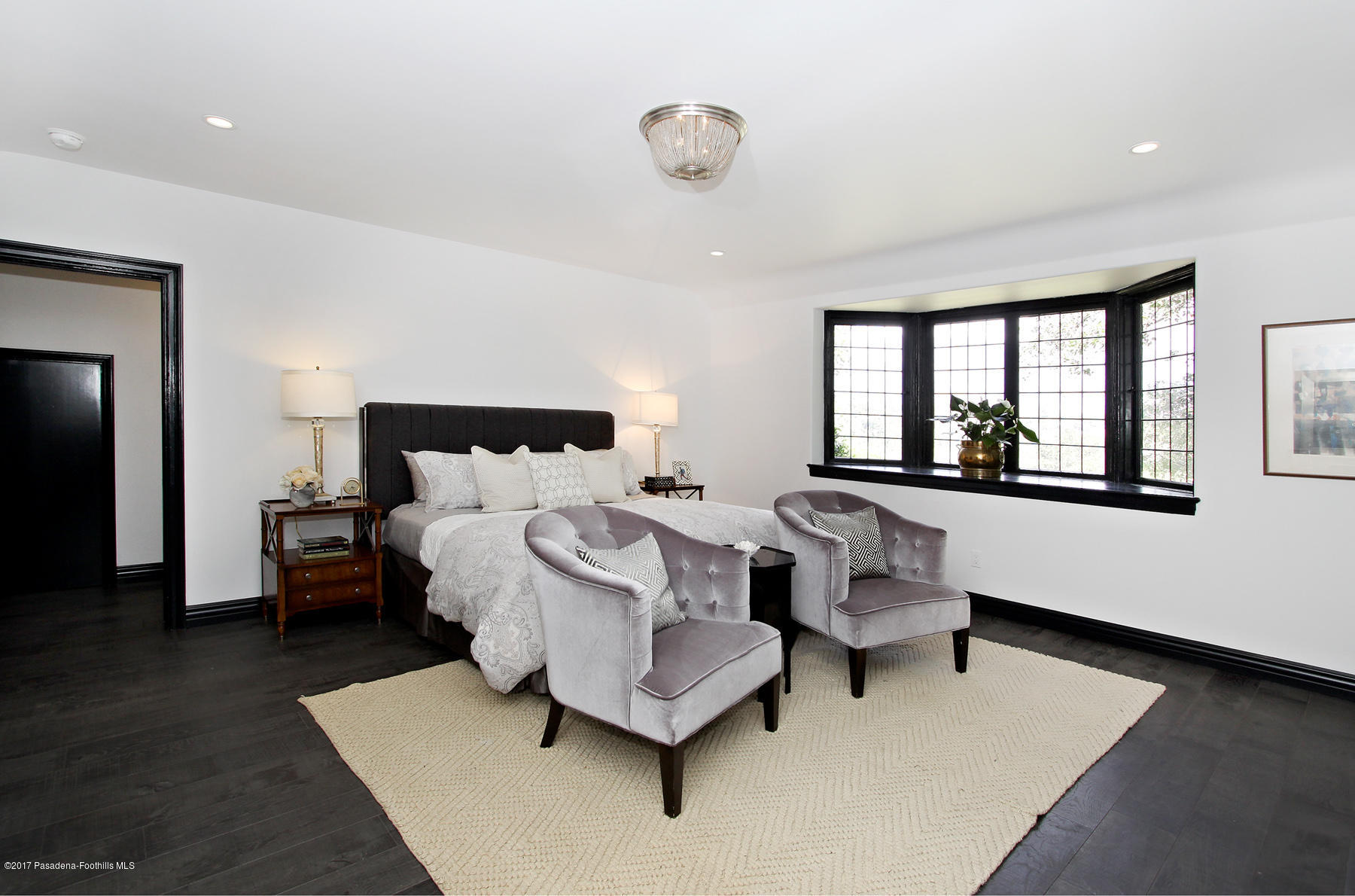 1415 Parkview Avenue Pasadena, CA 91103 - Photo 19 of 35 a bedroom with furniture and a large window