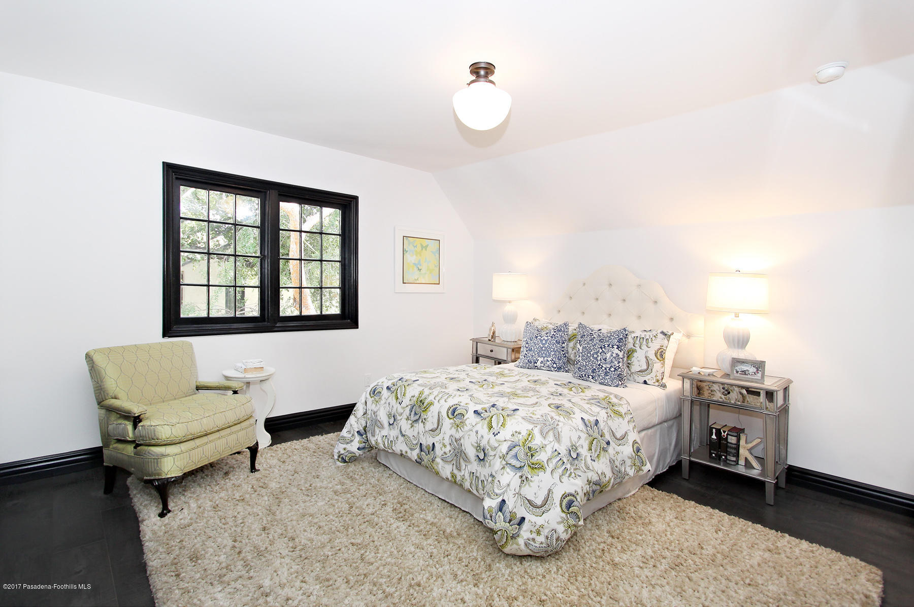 1415 Parkview Avenue Pasadena, CA 91103 - Photo 25 of 35 a bedroom with a bed and a couch