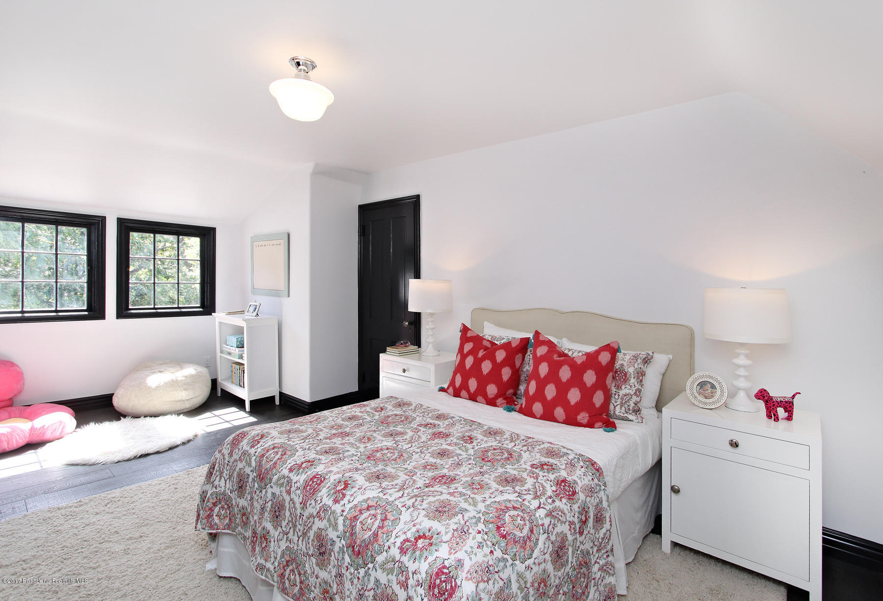 1415 Parkview Avenue Pasadena, CA 91103 - Photo 27 of 35 a bedroom with a bed and a couch