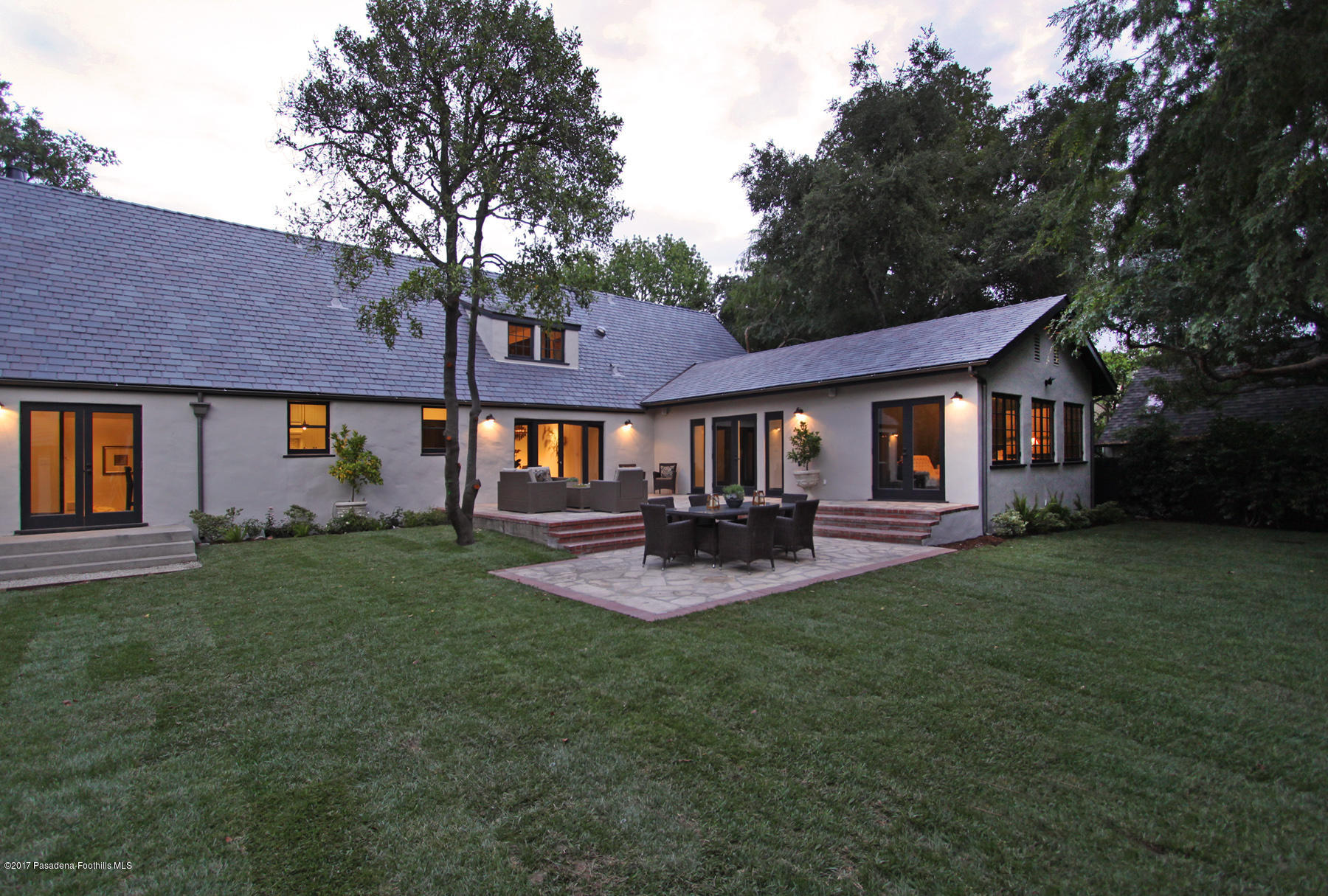 1415 Parkview Avenue Pasadena, CA 91103 - Photo 33 of 35 a front view of a house with patio and garden