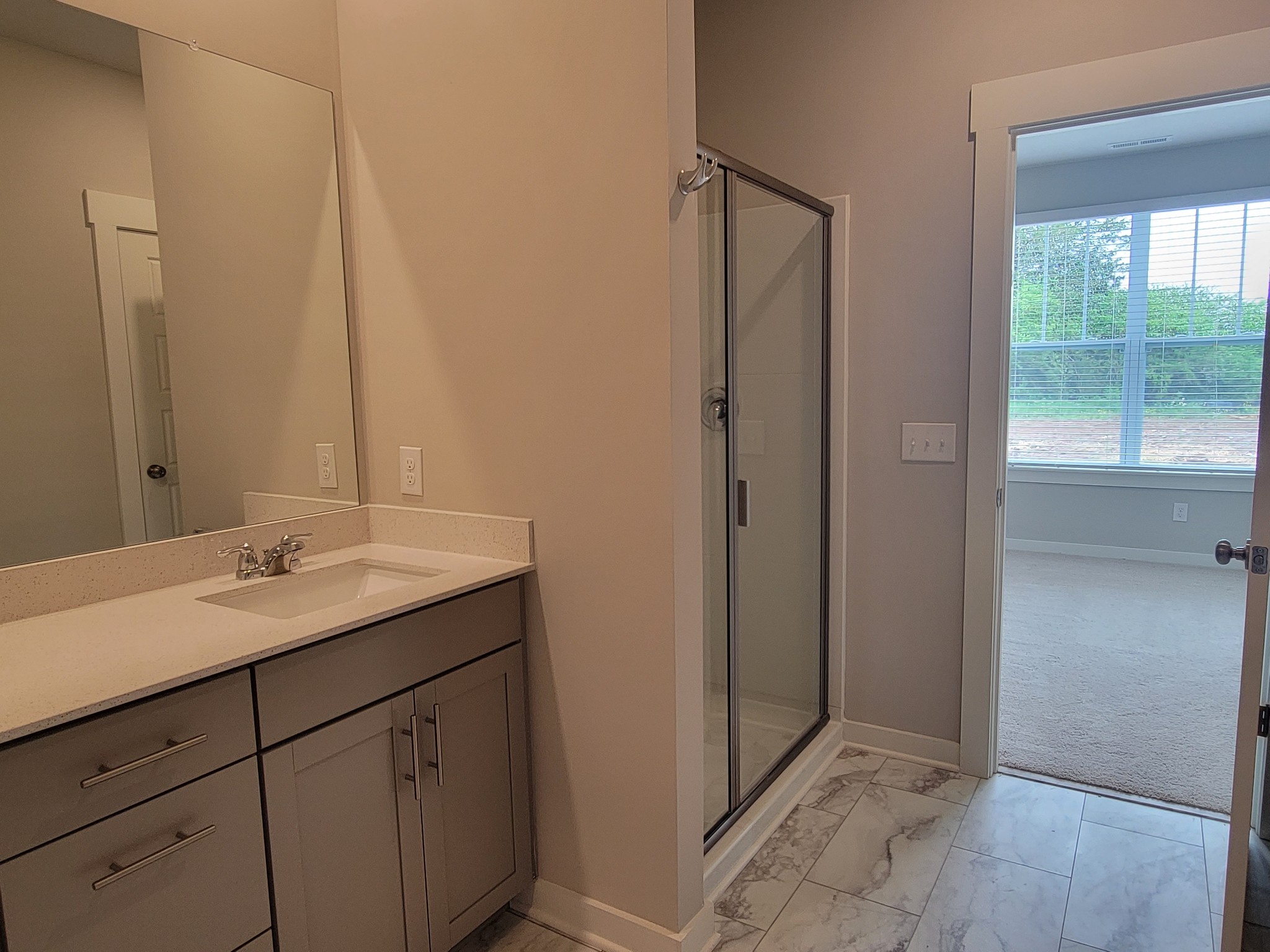 382 Casper Drive Spring Hill, TN 37174 - Photo 11 of 16 a bathroom with a sink and a mirror
