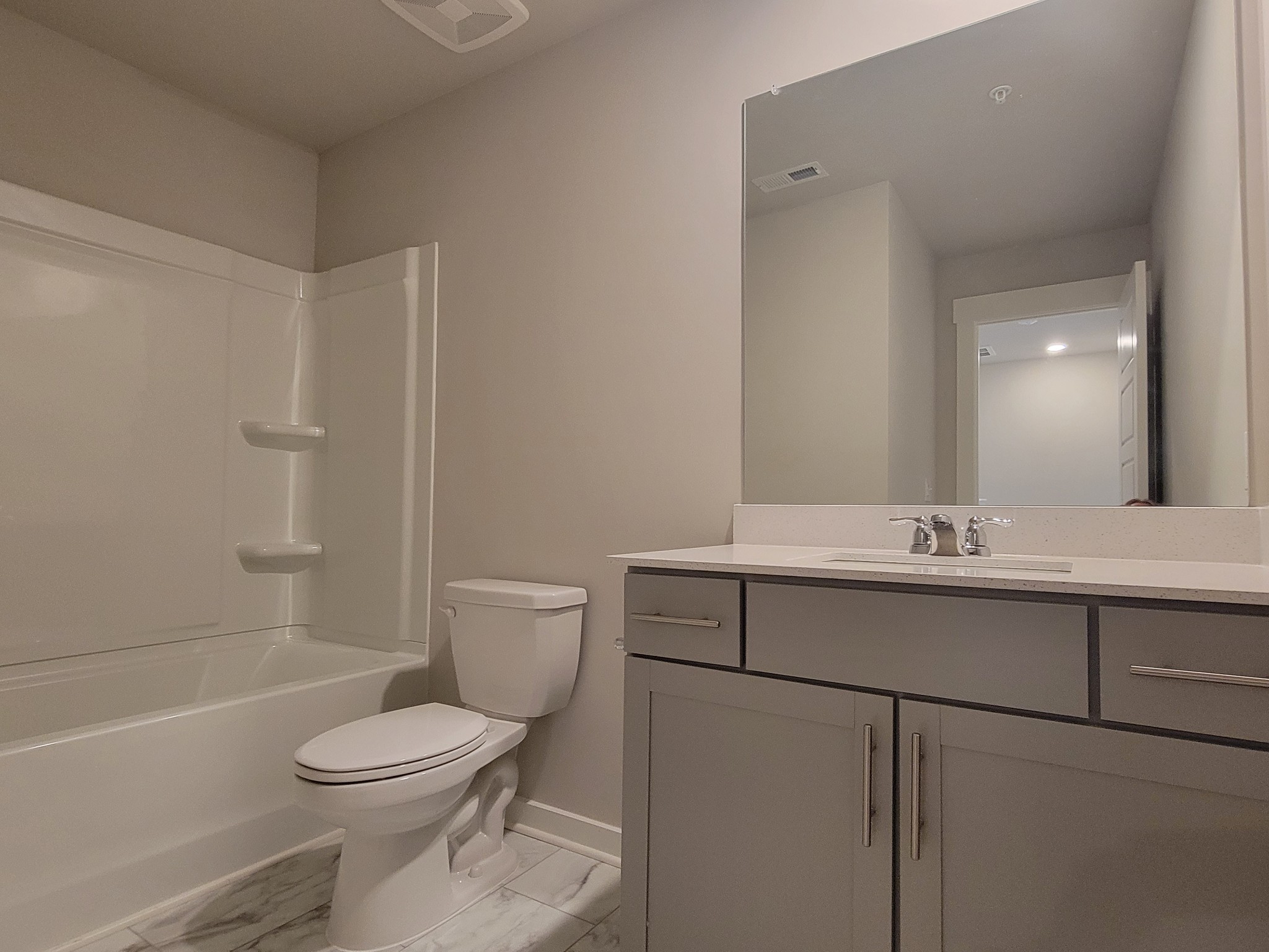 382 Casper Drive Spring Hill, TN 37174 - Photo 15 of 16 a bathroom with a sink a toilet and shower