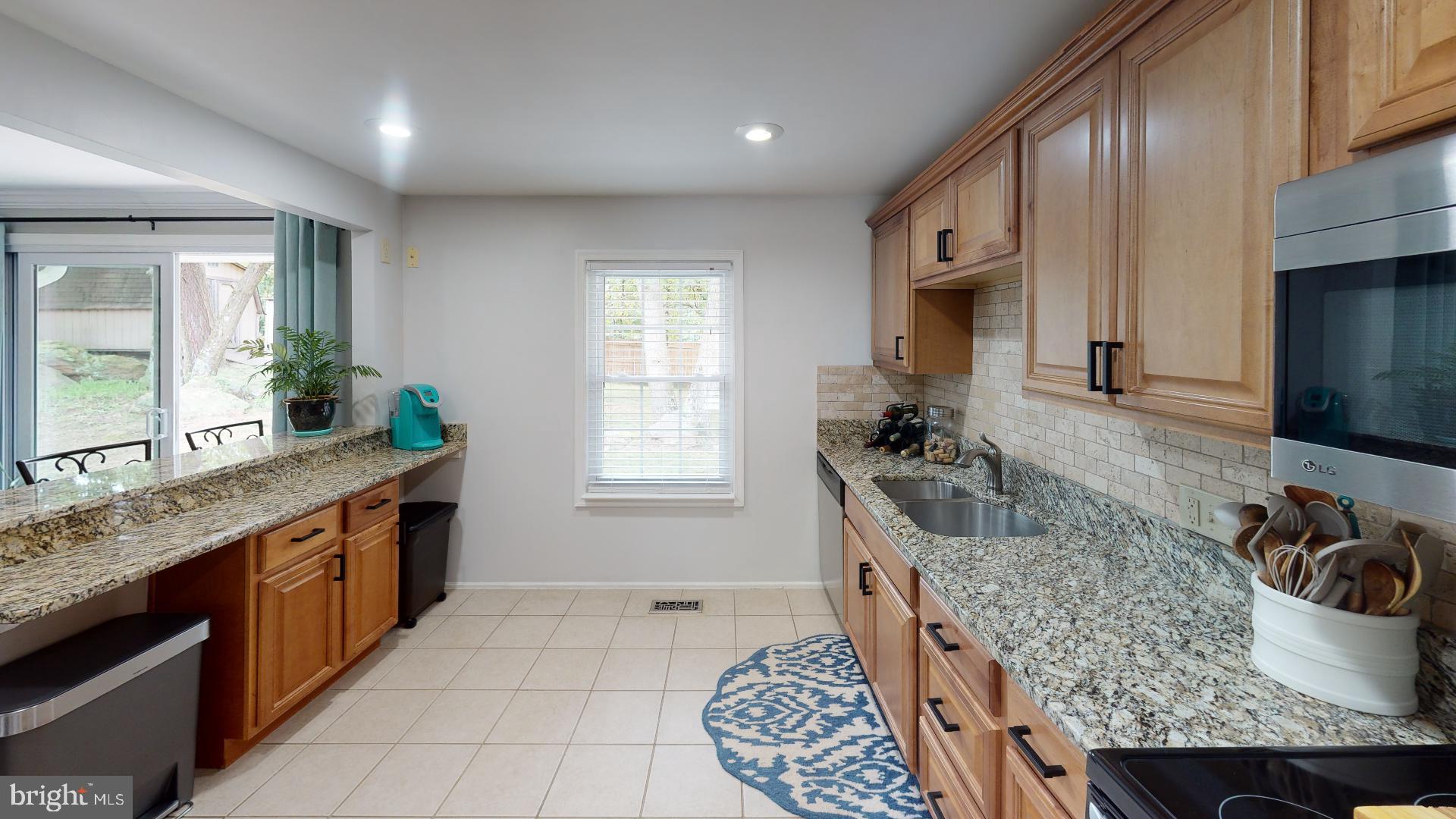 7808 Metacomet Road Hanover, MD 21076 - Photo 3 of 33 Plenty of Cabinetry and Counter Space