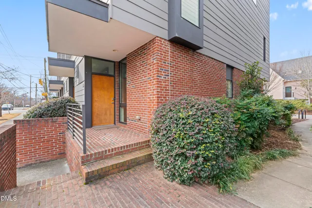 a view of a hallway with staircase