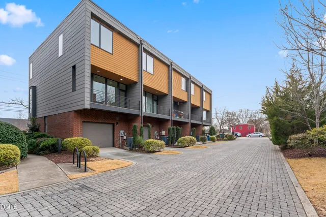 a view of a hallway with washer and dryer