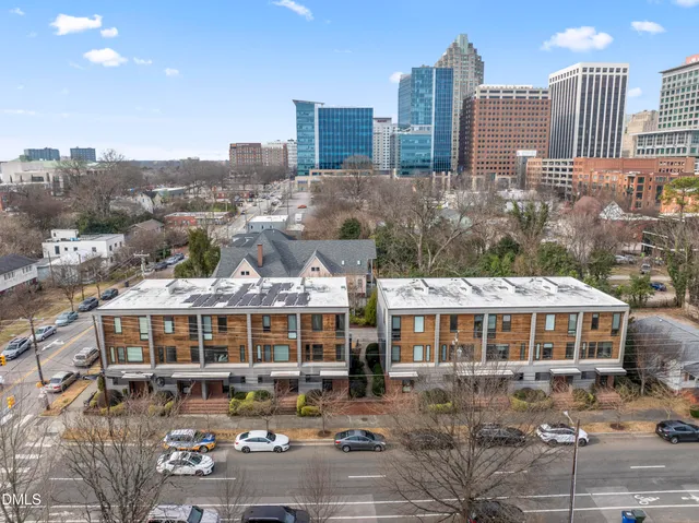 a view of a room with a stylish ceiling fan