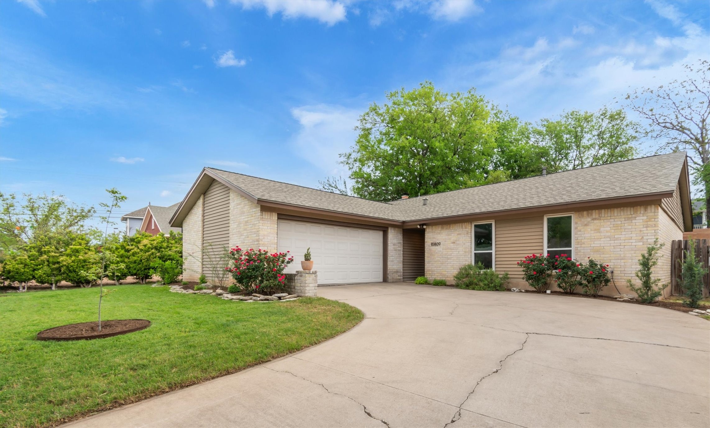 10809 Parkfield Drive Austin, TX 78758 - Photo 2 of 24 The kind of curb appeal that stops you mid-drive. Rose bushes in bloom and room to make it yours.