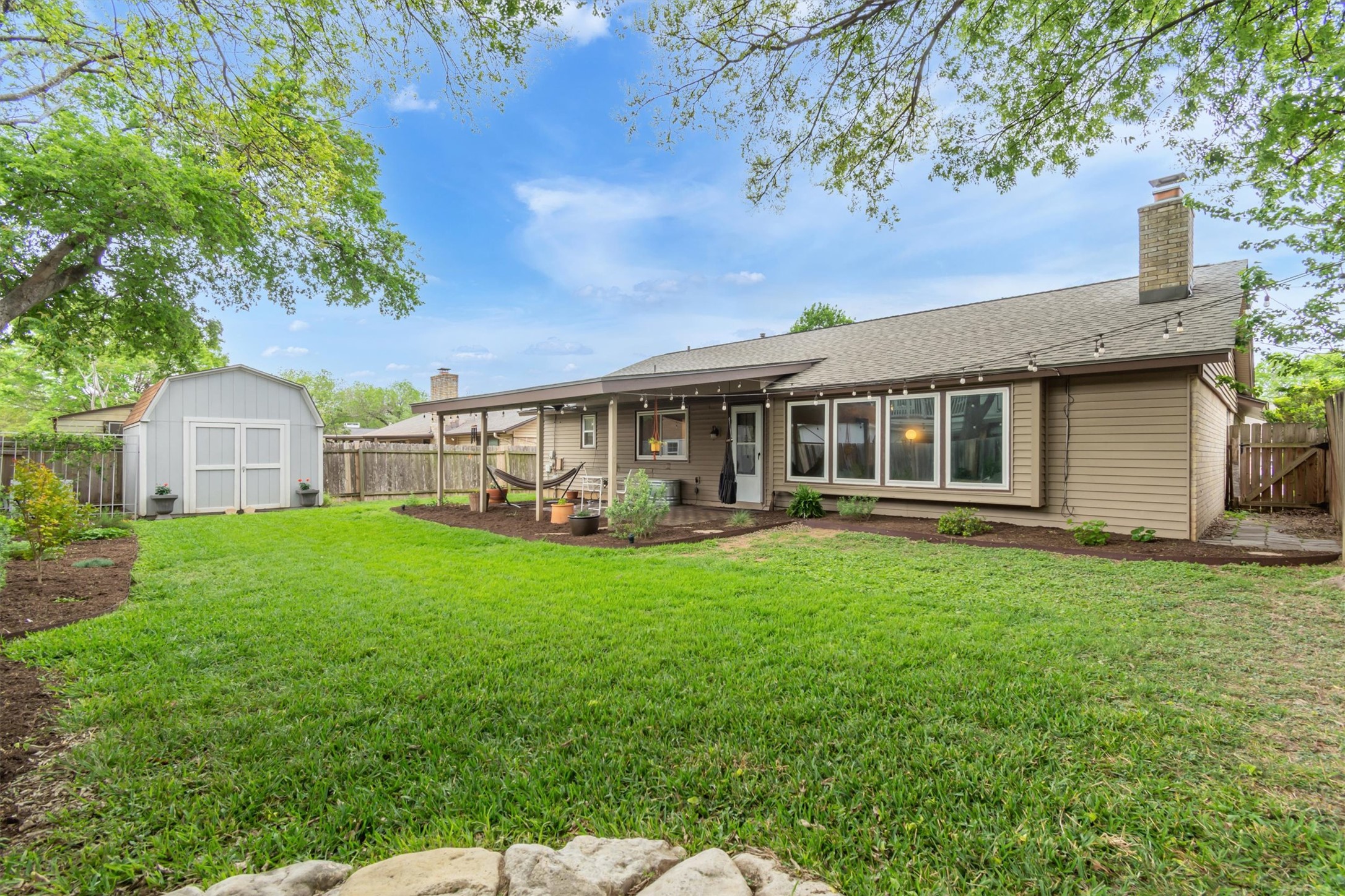 10809 Parkfield Drive Austin, TX 78758 - Photo 23 of 24 This backyard is the reason you move to Austin