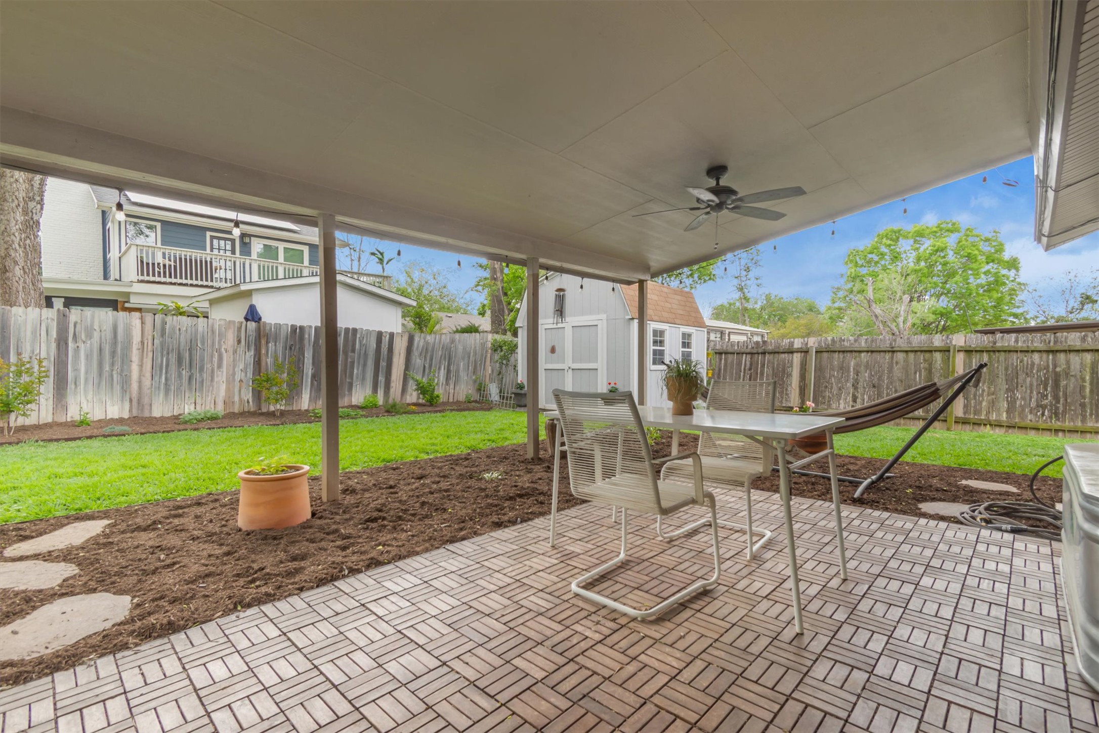 10809 Parkfield Drive Austin, TX 78758 - Photo 24 of 24 Covered patio with a fan — Texas outdoor living at its best