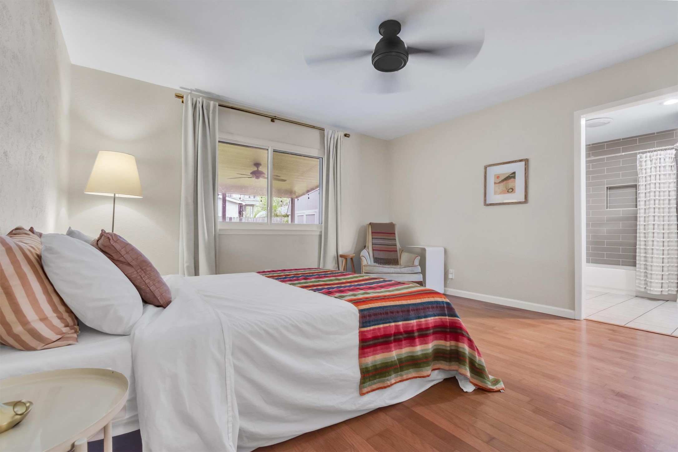10809 Parkfield Drive Austin, TX 78758 - Photo 4 of 24 Wake up to patio views and walk straight into your ensuite