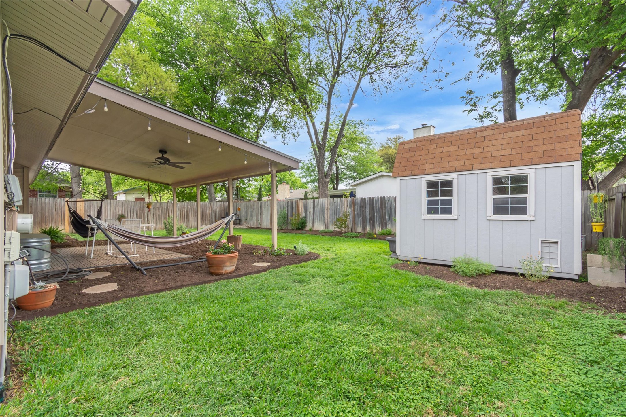 10809 Parkfield Drive Austin, TX 78758 - Photo 5 of 24 Shed for storage, hammock for doing absolutely nothing