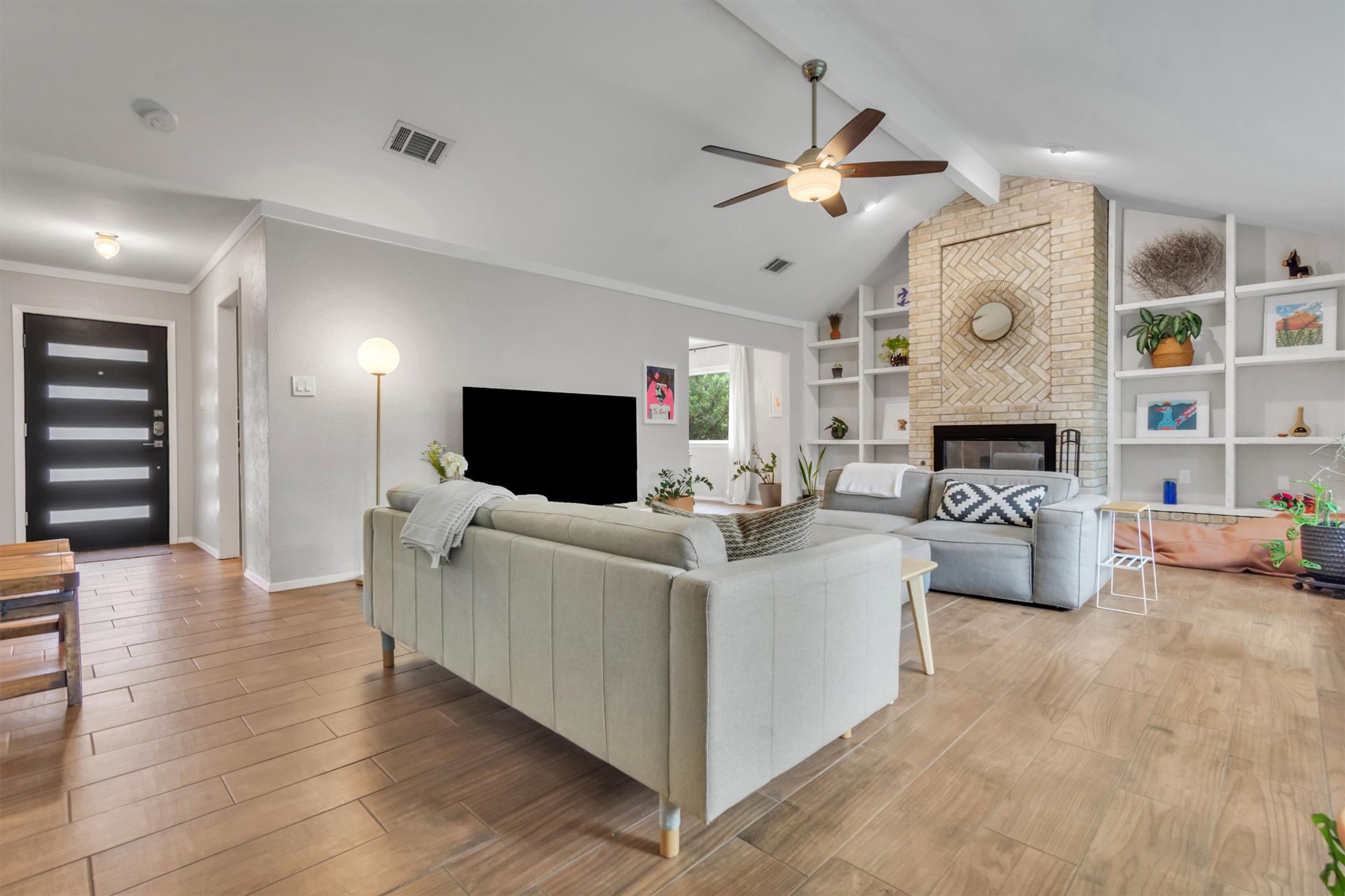 10809 Parkfield Drive Austin, TX 78758 - Photo 8 of 24 A living room built for real life and great parties
