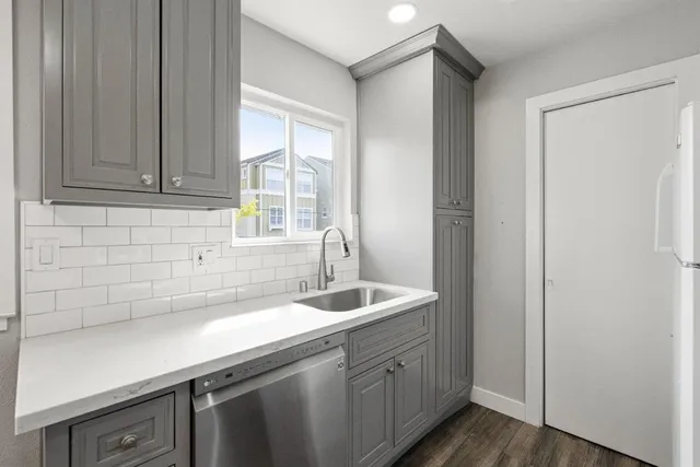 a bathroom with a sink and a window
