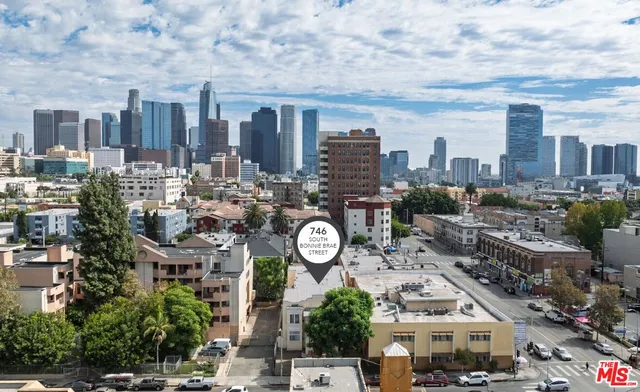 a city view with tall buildings