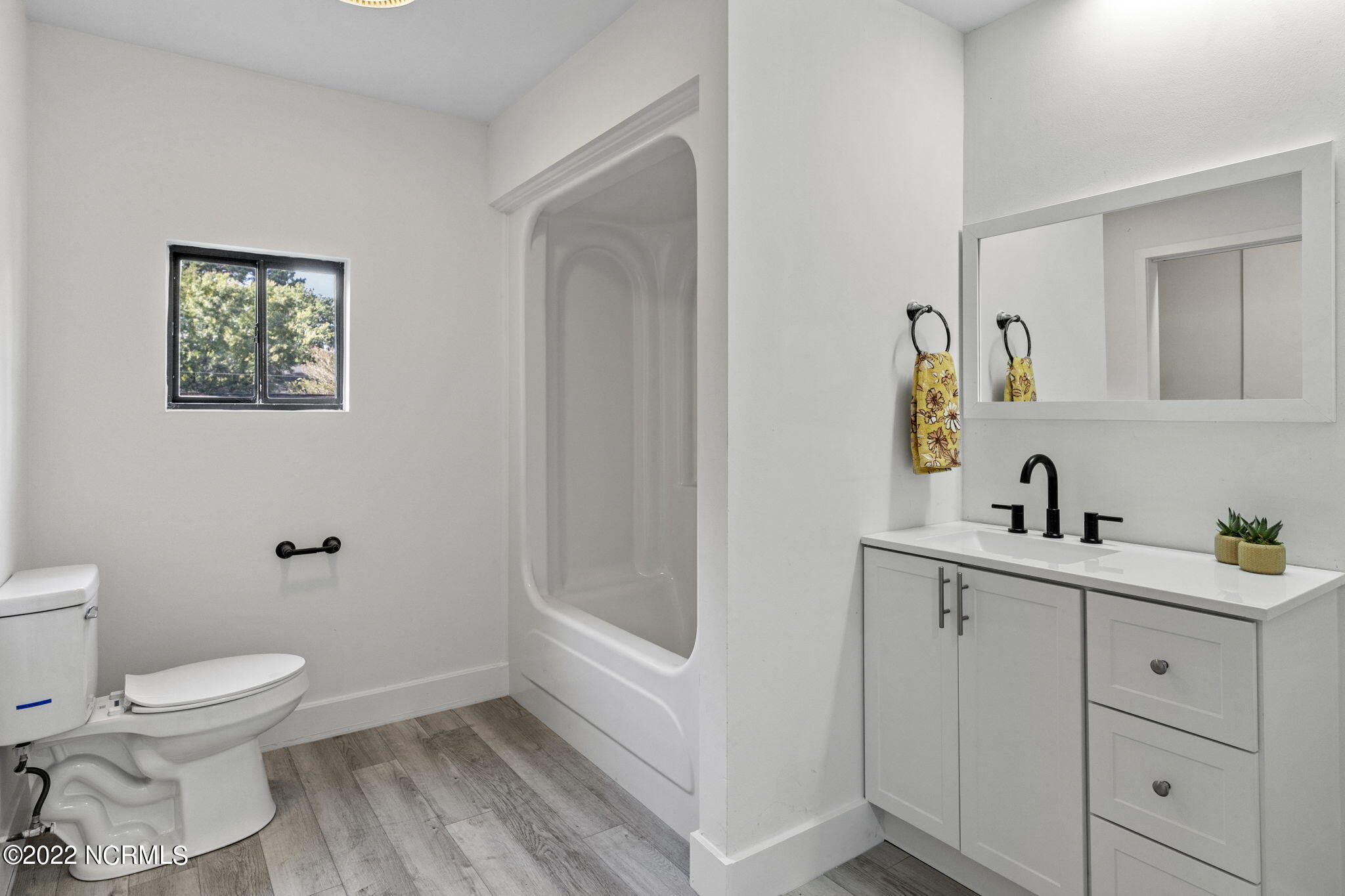 114 Trails End Road Wilmington, NC 28409 - Photo 27 of 54 Guest bathroom on primary floor