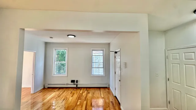 a view of empty room with front door