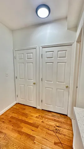 a view of a kitchen with a sink and a stove