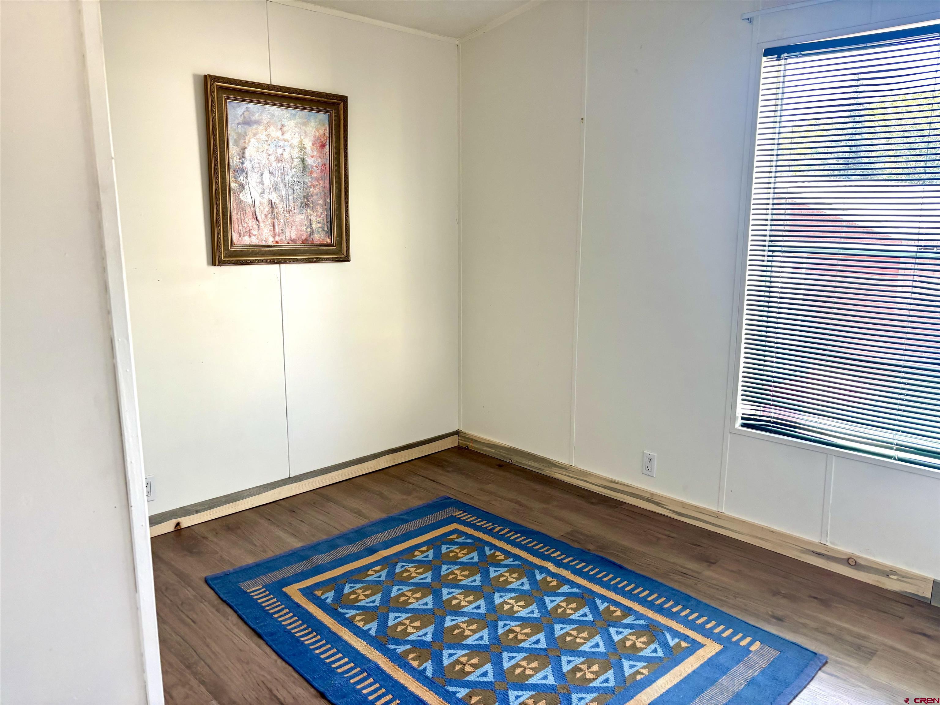 288 Animas View Drive, Unit 9 Durango, CO 81301 - Photo 12 of 16 a view of an empty room with a window