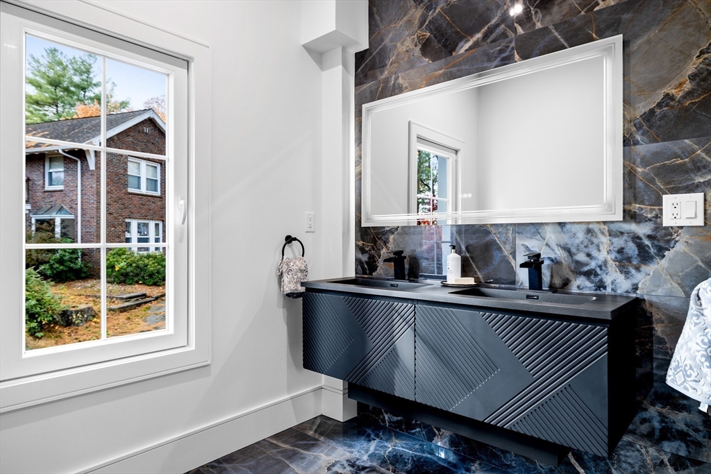 58 Chestnut Street Lynnfield, MA 01940 - Photo 21 of 42 a kitchen with a sink and a window