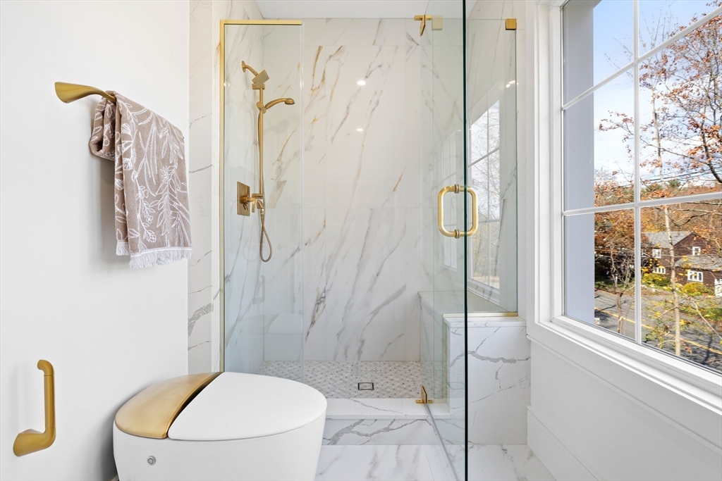 58 Chestnut Street Lynnfield, MA 01940 - Photo 24 of 42 a bathroom with a toilet and shower