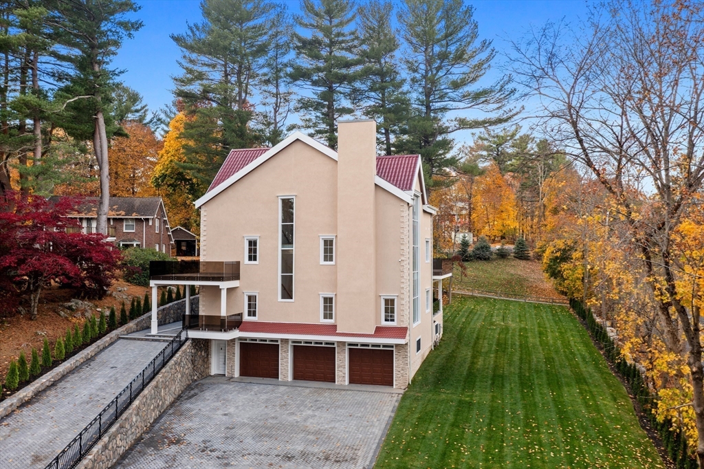 58 Chestnut Street Lynnfield, MA 01940 - Photo 31 of 42 a view of a house with backyard