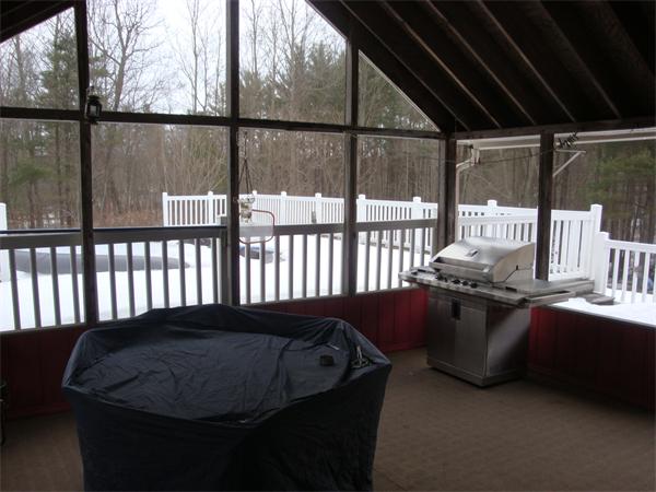 68 Middle Road Amesbury, MA 01913 - Photo 6 of 15 a bed sitting in a balcony next to a window
